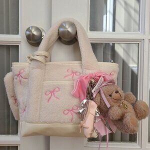 MADDEN GIRL SHERPA MINI TOTE WITH PINK BOWS AND CHARMS SO PRETTY